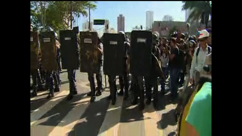 World Cup protestors clash with police